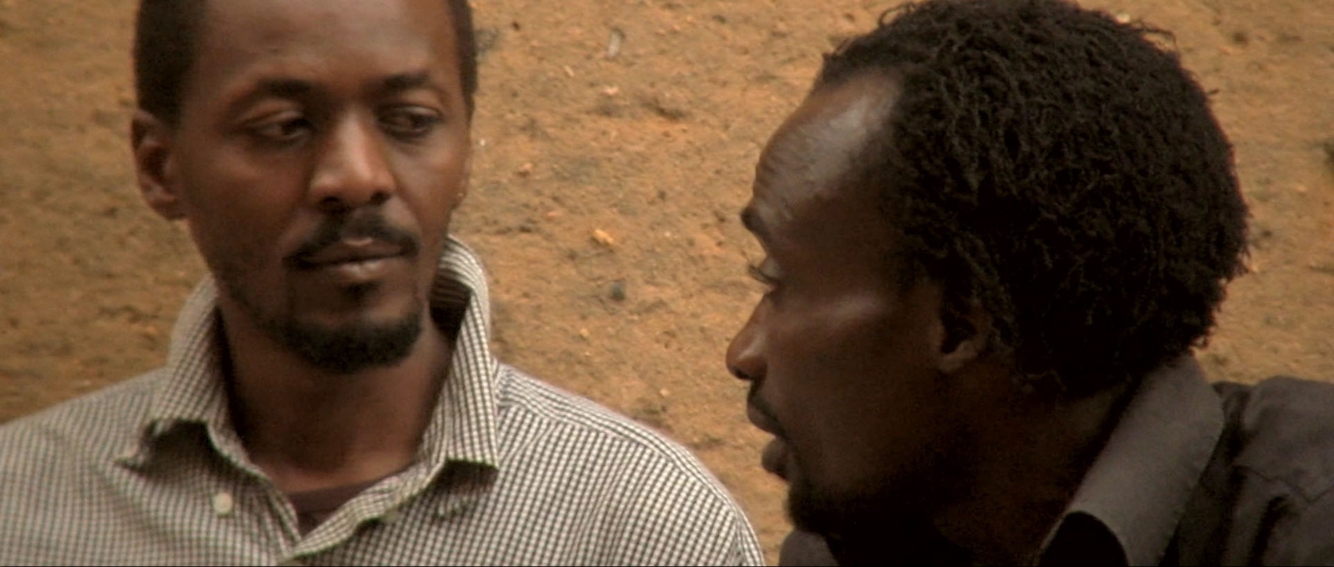 Lead actor James Bagyenzi on left with supporting actor <b>Henry Opio</b> on right. - 03.Still050