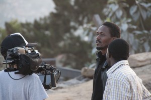 Left to right: Director Young G. Kim, lead actor James Bagyenzi and supporting actor Felix Bwanika get ready for a take.
